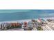 Aerial view highlighting the home's beachfront location at 19718 Gulf Blvd, Indian Shores, FL 33785