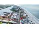 Aerial view showing home's proximity to beach and other buildings at 19718 Gulf Blvd, Indian Shores, FL 33785