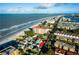 Aerial view of beachfront home and neighborhood at 19718 Gulf Blvd, Indian Shores, FL 33785