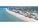 Aerial view of coastline and beach community at 19718 Gulf Blvd, Indian Shores, FL 33785