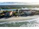 Aerial view of beachfront homes and ocean at 19718 Gulf Blvd, Indian Shores, FL 33785