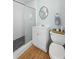 Bathroom with white vanity, toilet and shower stall at 19718 Gulf Blvd, Indian Shores, FL 33785