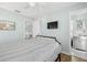 Bedroom with a queen-size bed and en-suite bathroom at 19718 Gulf Blvd, Indian Shores, FL 33785