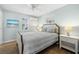 Bedroom with a queen-size bed and coastal decor at 19718 Gulf Blvd, Indian Shores, FL 33785