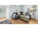 Living area with gray sectional sofa and wooden coffee table at 19718 Gulf Blvd, Indian Shores, FL 33785