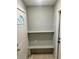 Inviting entryway with built-in shelving and bench at 8735 Cristobal Ave, North Port, FL 34287