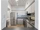Modern kitchen features stainless steel appliances and stylish backsplash at 2411 W Horatio St # 522, Tampa, FL 33609