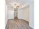 Light and airy bedroom with wood-look floors and access to bathroom at 2411 W Horatio St # 522, Tampa, FL 33609