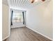 Spacious bedroom featuring wood-look floors and a ceiling fan at 2411 W Horatio St # 522, Tampa, FL 33609