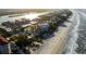 Aerial view of beach, ocean, and neighborhood at 19718 Gulf Blvd, Indian Shores, FL 33785