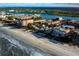 Aerial view showing beachfront property and neighborhood at 19718 Gulf Blvd, Indian Shores, FL 33785