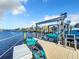 Private dock with kayak lift, perfect for water activities at 949 Symphony Isles Blvd, Apollo Beach, FL 33572