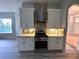 Modern kitchen with stainless steel appliances and granite countertops at 10411 Riverburn Dr, Tampa, FL 33647