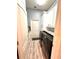 Laundry room with washer, dryer, and granite countertop at 10411 Riverburn Dr, Tampa, FL 33647
