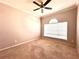 Bedroom with carpet, ceiling fan, and large window at 10411 Riverburn Dr, Tampa, FL 33647