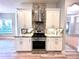 Modern kitchen with stainless steel appliances and granite countertops at 10411 Riverburn Dr, Tampa, FL 33647