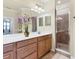 Spa-like bathroom with double vanity and walk-in shower at 20180 Ragazza Cir # 201, Venice, FL 34293