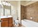 Clean bathroom with tub, toilet and single vanity at 20180 Ragazza Cir # 201, Venice, FL 34293