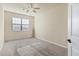 Bright bedroom with neutral walls and carpeted floor at 20180 Ragazza Cir # 201, Venice, FL 34293