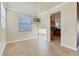 Separate dining area with tile floors and kitchen access at 20180 Ragazza Cir # 201, Venice, FL 34293