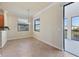 Bright dining room featuring tile floors and a view at 20180 Ragazza Cir # 201, Venice, FL 34293
