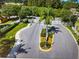 Gated community entrance with landscaped median at 30029 Granda Hills Ct, Wesley Chapel, FL 33543