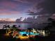 Night view of resort-style pool overlooking the water at 5155 Isla Key S Blvd # 402, St Petersburg, FL 33715