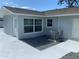 Newly renovated house exterior with newly painted walls and landscaping at 12612 Litewood Dr, Hudson, FL 34669