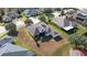 Elevated view of a house with a spacious backyard and a playset at 13267 Linzia Ln, Spring Hill, FL 34609