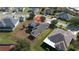 Aerial view of the home's back exterior showcasing the yard and roof at 13267 Linzia Ln, Spring Hill, FL 34609
