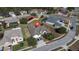 High-angle aerial view of a suburban home with nearby houses at 13267 Linzia Ln, Spring Hill, FL 34609