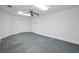 Unfinished basement with bright, painted walls and a ceiling fan at 3418 Braeside Pl, Clearwater, FL 33759