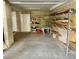 Functional garage space with shelving and door access at 6231 Bayshore Blvd, Tampa, FL 33611