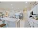 Large kitchen with ample counter space, white cabinets, and stainless steel appliances at 13267 Linzia Ln, Spring Hill, FL 34609