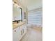 Clean bathroom with white vanity, shower, and tub at 13267 Linzia Ln, Spring Hill, FL 34609