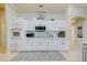 Modern kitchen with white cabinets and built-in microwave at 13267 Linzia Ln, Spring Hill, FL 34609