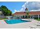 Inviting community pool with lounge chairs at 13267 Linzia Ln, Spring Hill, FL 34609