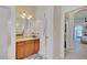 Primary bathroom with vanity and access to closet at 13267 Linzia Ln, Spring Hill, FL 34609