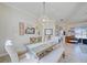 Bright dining area with a farmhouse table and bench seating at 13267 Linzia Ln, Spring Hill, FL 34609