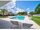 Inviting community pool with plenty of lounge chairs at 13267 Linzia Ln, Spring Hill, FL 34609