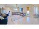 Relaxing living room with sectional sofa and tile floors at 13267 Linzia Ln, Spring Hill, FL 34609