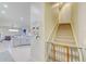 Staircase with a baby gate, leading to the upper level at 13267 Linzia Ln, Spring Hill, FL 34609