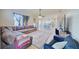 Spacious living room boasts a large sectional sofa and ample natural light at 13267 Linzia Ln, Spring Hill, FL 34609
