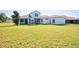 Spacious backyard offering a large grassy area at 13267 Linzia Ln, Spring Hill, FL 34609