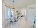 Bright dining nook with a table and chairs near the kitchen at 13267 Linzia Ln, Spring Hill, FL 34609