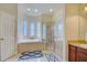 Primary bathroom with soaking tub and walk-in shower at 13267 Linzia Ln, Spring Hill, FL 34609