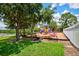Community playground with playset and shaded areas at 13267 Linzia Ln, Spring Hill, FL 34609