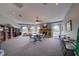 Relaxing community room with a fireplace and comfortable seating at 13267 Linzia Ln, Spring Hill, FL 34609