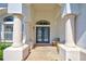 Elegant entryway with double doors and decorative flooring at 13267 Linzia Ln, Spring Hill, FL 34609