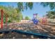 playground with swings and climbing structures at 13267 Linzia Ln, Spring Hill, FL 34609